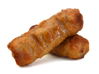 Two smoked sausage against the white background