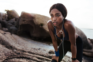 Tired woman resting after running