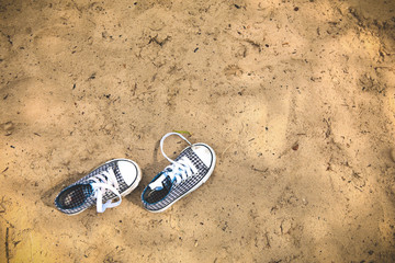 sneakers child sand beach shoelaces