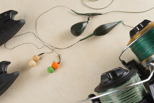 Baits, hooks, sinkers, reels, is preparing for carp fishing. Copy paste