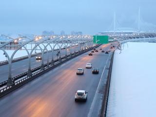 speed road in the winter evening