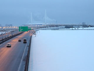 speed road in the winter evening