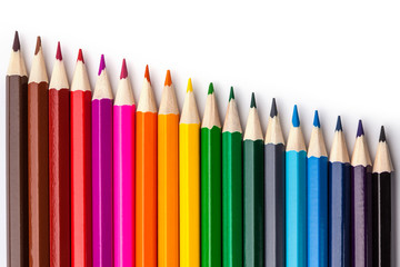 sharpened colored pencils on a white background.