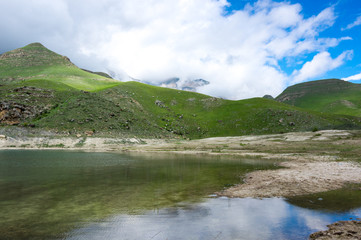Naklejka na ściany i meble Bylym lake in the Caucasus mountains in Russia