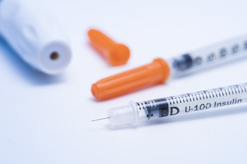 Close-up Insulin syringes and lancet for glucose test