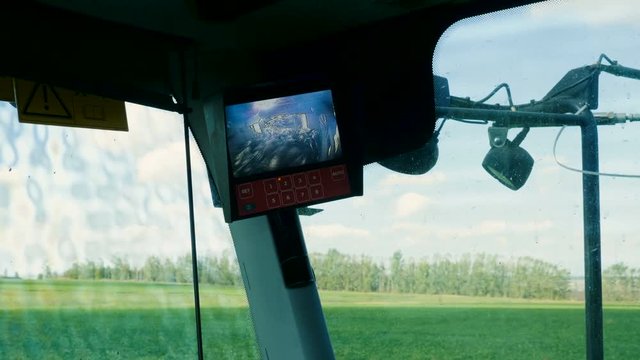 Cab of combine harvester during the harvest of sugar beet. 4K