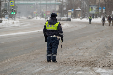 Traffic policeman on duty in winter