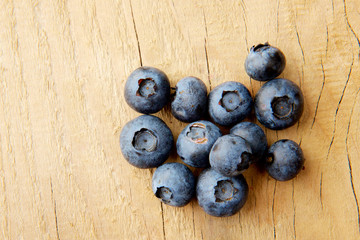 blueberries on a wooden background