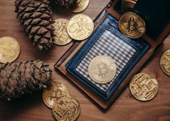 bitcoin with cash on the wood table