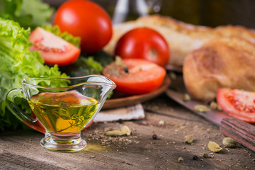 tomato, cucumber, lettuce, baguette, olive oil and spices
