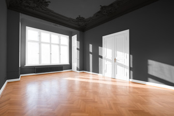 Empty room with parquet floor - apartment interior 