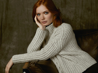 Portrait of redhead girl in studio