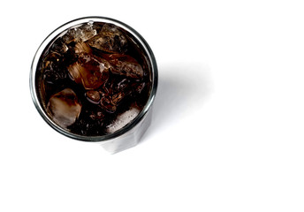 Cola in the glass with ice, top view