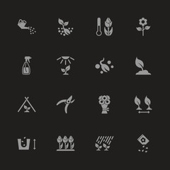 Flowers Growing icons - Gray symbol on black background. Simple illustration. Flat Vector Icon.