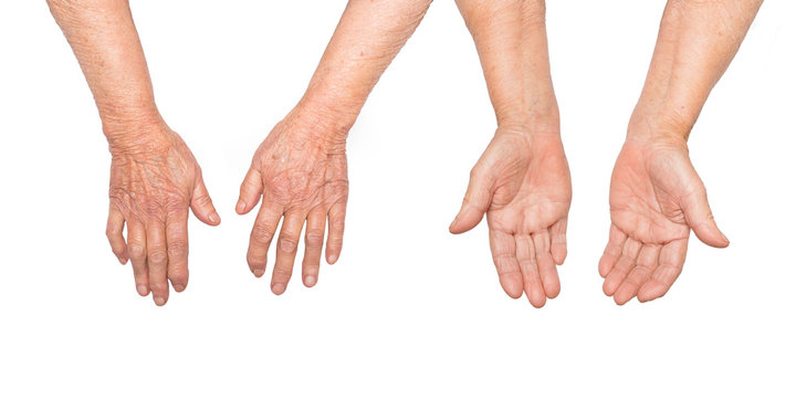 Hands of an elderly woman isolated on white background. Senior lady wrinkled hand with copyspace for your text.