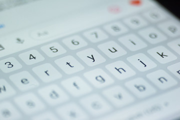 White keyboard on smartphone.