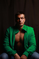 Fototapeta premium closeup .stylish guy in the green shirt.