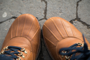 brown or yellow boots shoes for foot and adventure travel