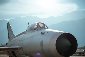 Aircraft fighter against the mountains