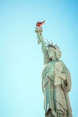 Statue of liberty against the blue sky