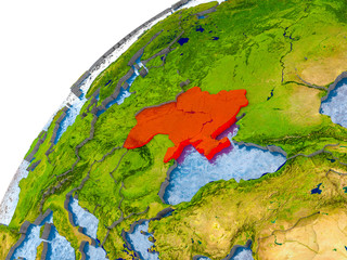 Map of Ukraine in red on globe