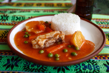 Typical peruvian meal with stewed meat and rice, Peru