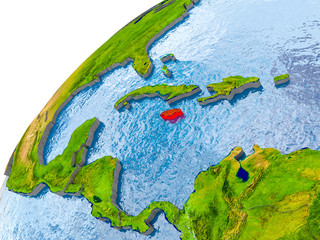 Map of Jamaica in red on globe