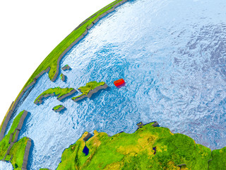 Map of Puerto Rico in red on globe