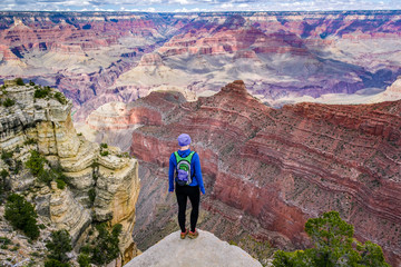 Girl on a Grand Canyon Cliff