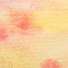 Red, orange and yellow abstract watercolor painting textured on white paper background
