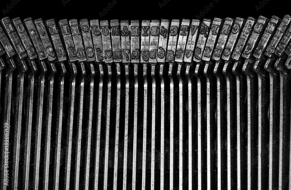Fototapete macro detail of typescript inside electric typewriter