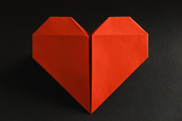 origami heart red paper symbol on black