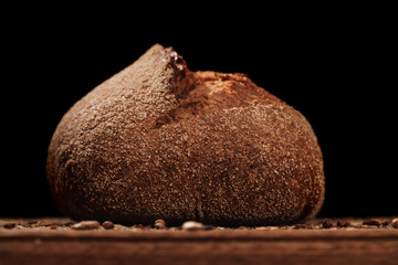 Whole Fragrant bread on the table. Food on cutting board