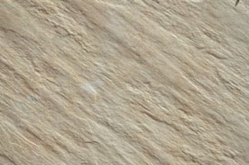 Closeup on ceramic tile detailed surface rough marbled textured background