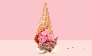 Ice cream on the ground.  Ice cream cone dropped on floor