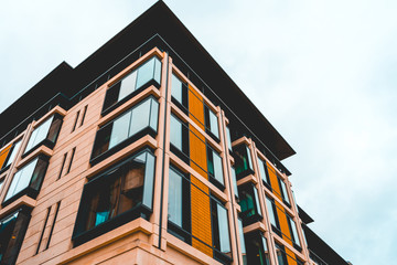 real estate building with orange facade