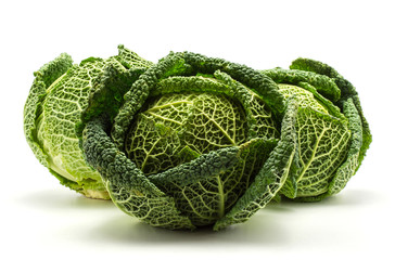 Three savoy cabbages isolated on white background fresh green heads.