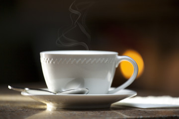 White Coffee Mug with Steam on Kitchen Counter