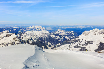 The Alps, view from the top of Mt. Titlis in Switzerland in the very beginning of spring