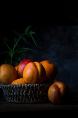 yellow peaches in basket