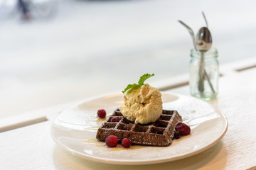 Fresh waffles chocolate topped with ice cream