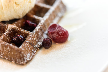 Fresh waffles chocolate topped with ice cream