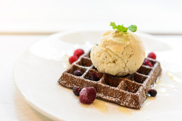 Fresh waffles chocolate topped with ice cream