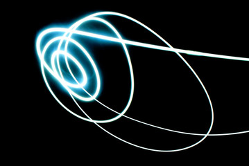 White Color Light Painting Photography Over Black Background