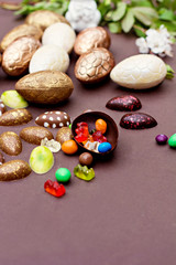 Chocolate eggs with a surprise of gold and bronze colors.
