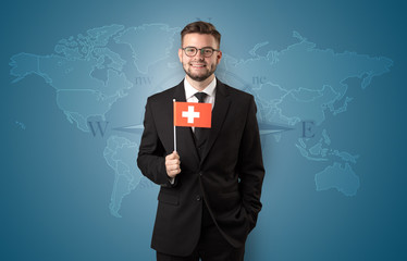 Man standing with flag and map background