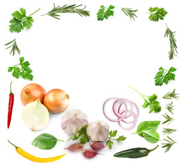 Garlic and other vegetables and herbs on white background