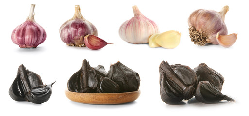 Set with aromatic black (Allium sativum) and white garlic bulbs on white background