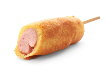 Tasty corn dog on white background
