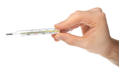 Woman holding mercury thermometer on white background
